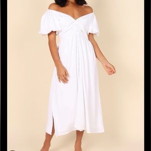 Percie off shoulder white dress by petal and pup. Tried on once. Size medium.